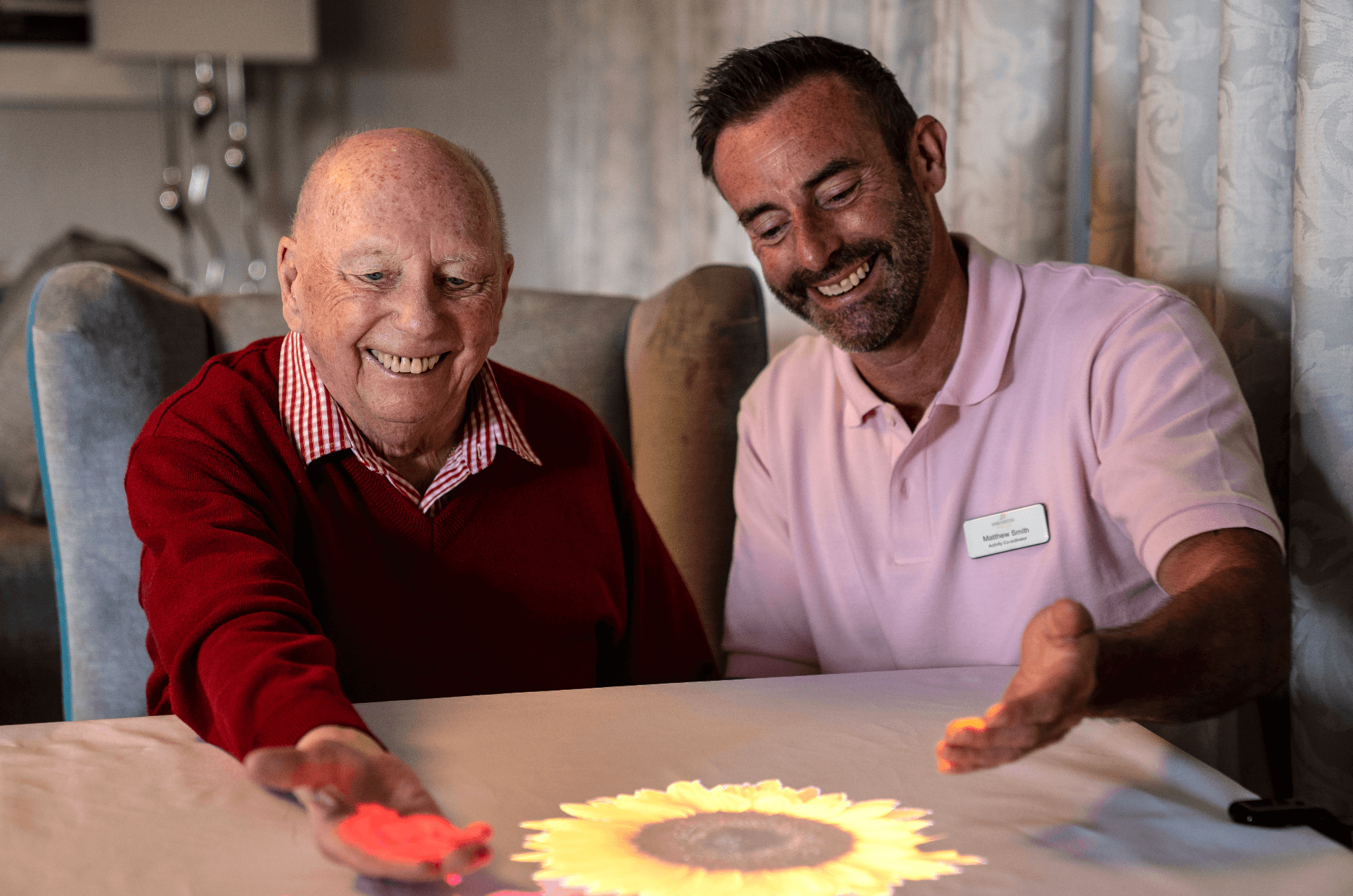 dementia patient and nurse using a magic table